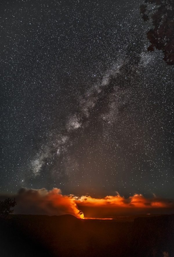 The milky in the night sky over a canyon.