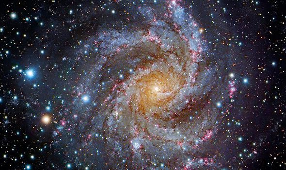 An image of a spiral galaxy in space.