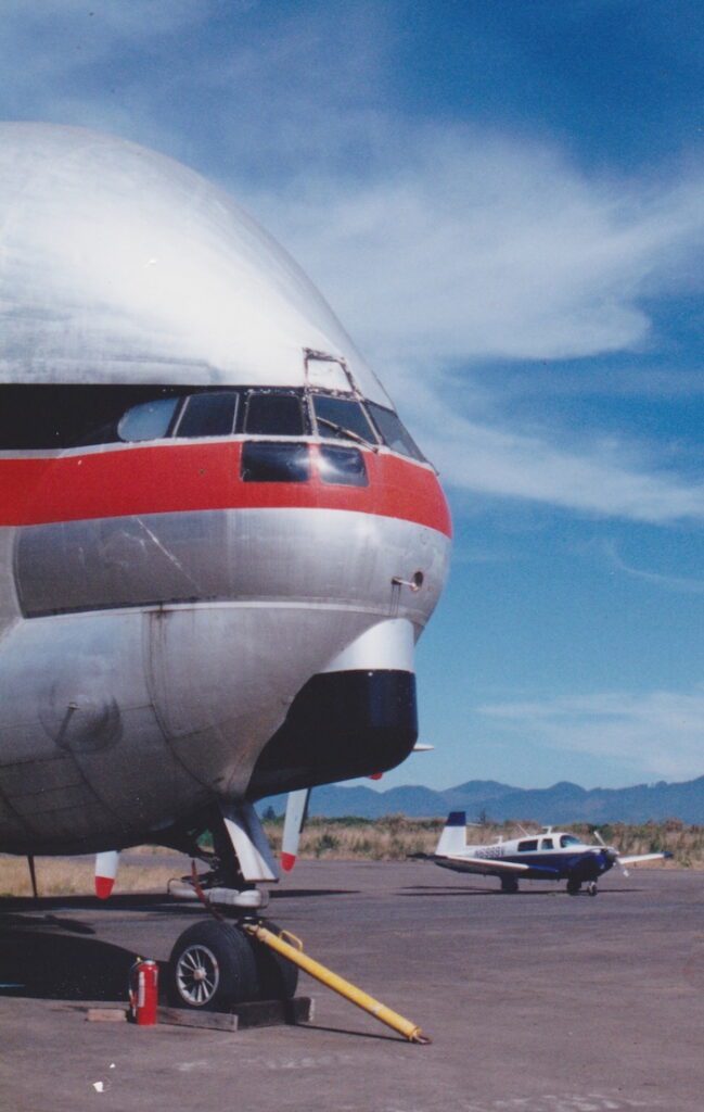 A large airplane parked on the tarmac.