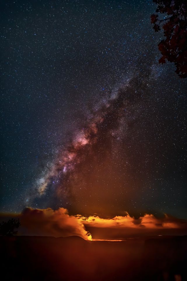 The milky way over a lava field in hawaii.